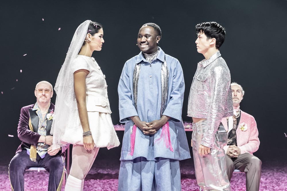 Much Ado About Nothing. Mara Huf (Hero), Phillip Olagoke (Friar Francis) & James Phoon (Claudio). Credit Marc Brenner. 9071